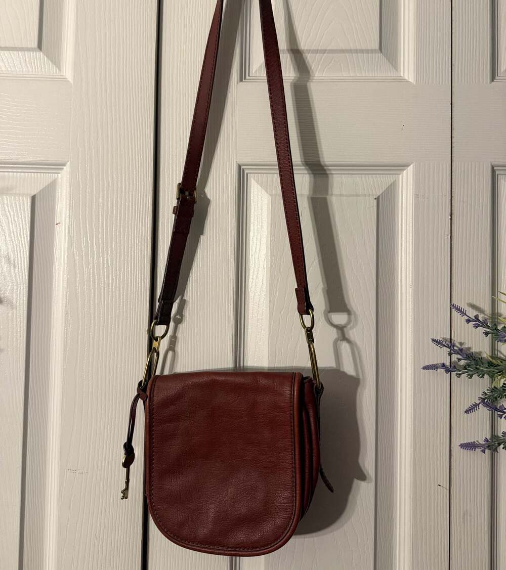 Fossil Burgundy Pebbled Leather Foldover Crossbody Saddle Bag with Key Charm